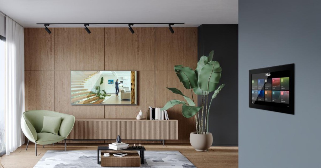Nice Home Control touch panel in modern living room with audio distribution