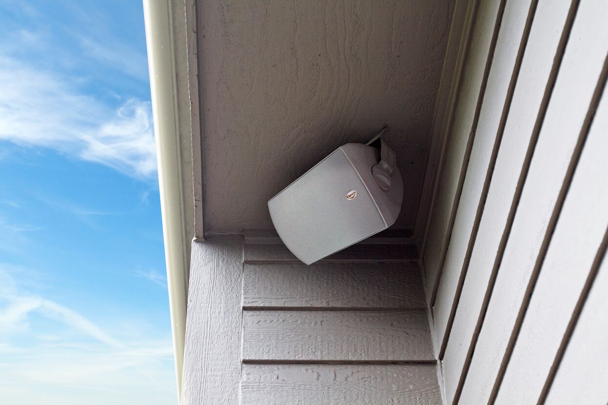 Klipsch outdoor speaker mounted under eave