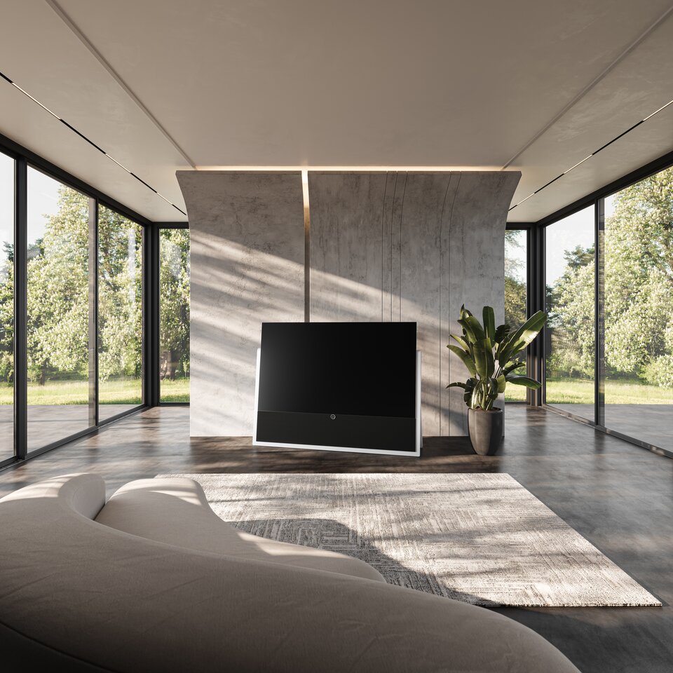 Loewe TV on premium floor stand in architectural living space