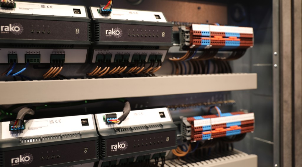 Rako DIN rail lighting control modules installed in rack
