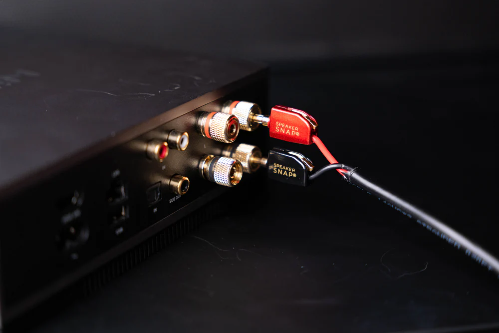 Speaker Snap premium banana plugs connected to amplifier binding posts
